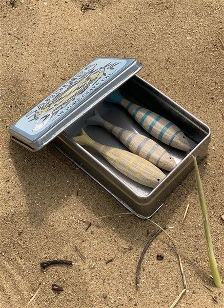 Wooden sardines in a tin