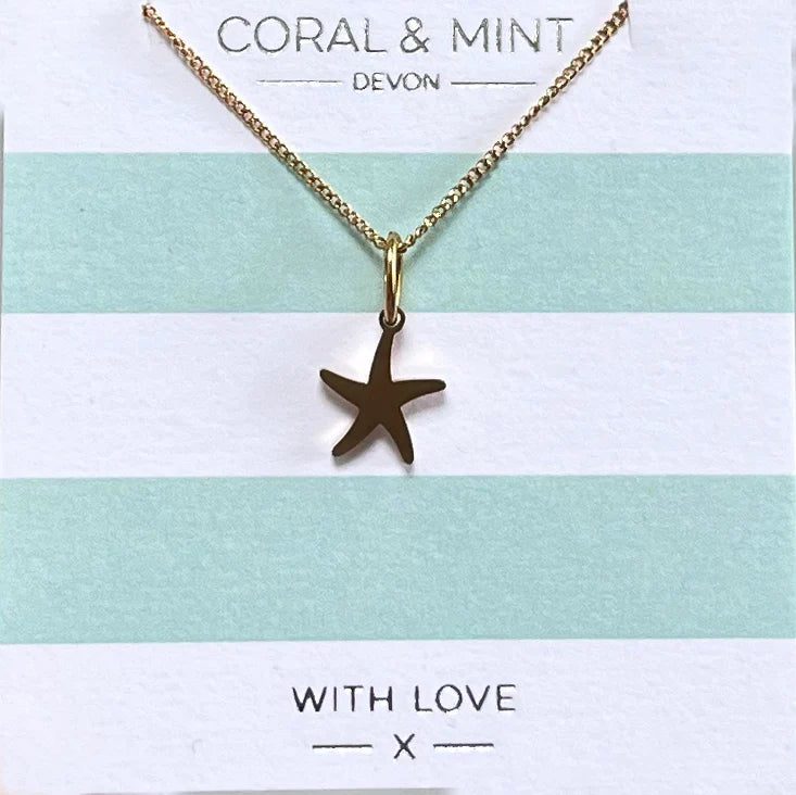 Gold starfish charm necklace